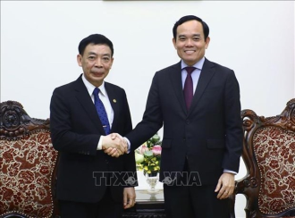 Vietnam’s DPM Tran Luu Quang receives Lao Minister of Home Affairs